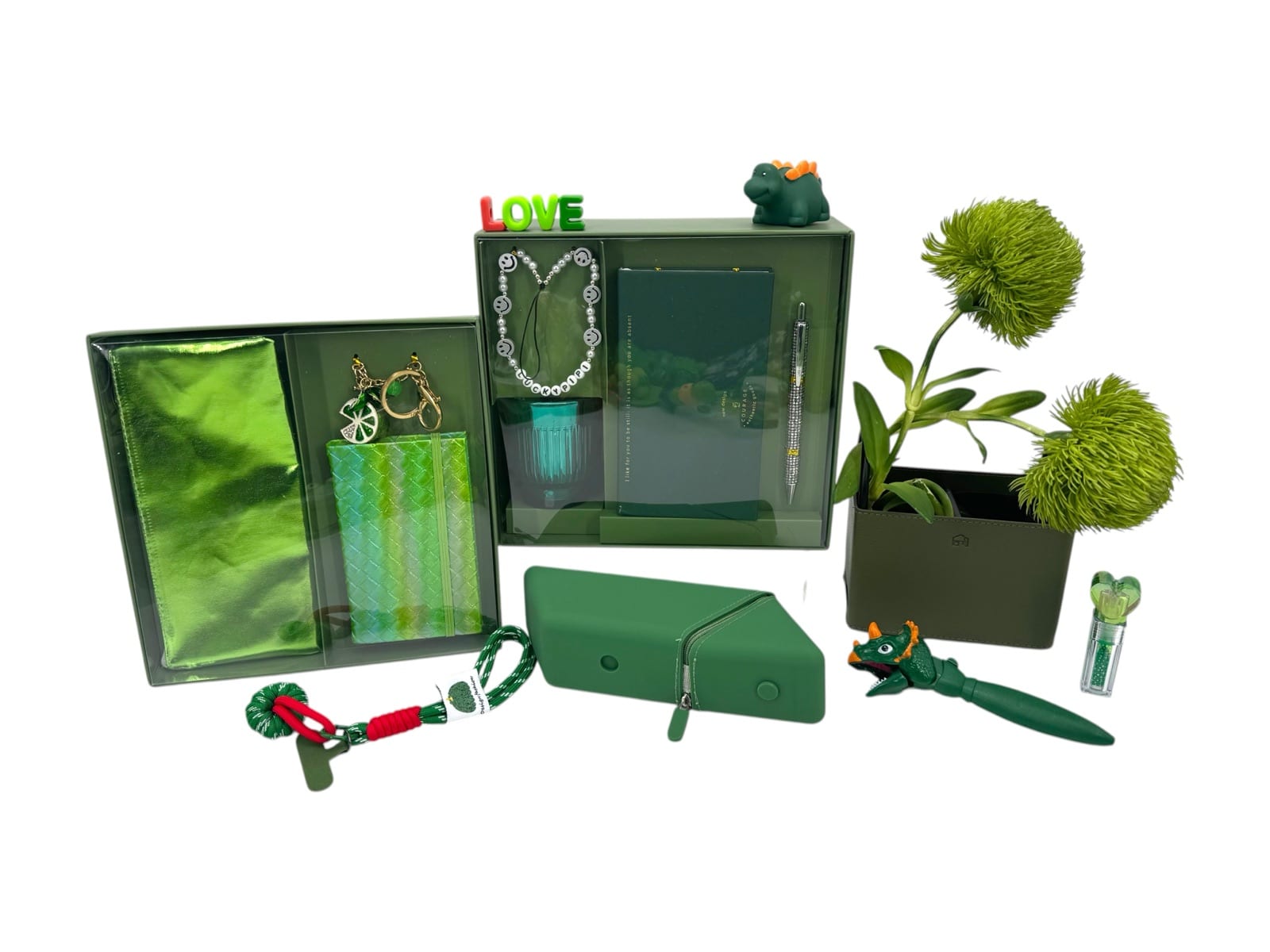 Green stationery collection with two window gift boxes, fitted product compartments and coordinated accessories